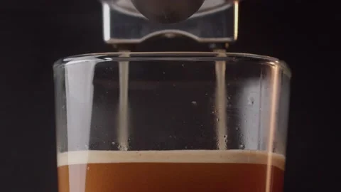 Frothy coffee drink poured into transparent glass. Stock Footage 199474290