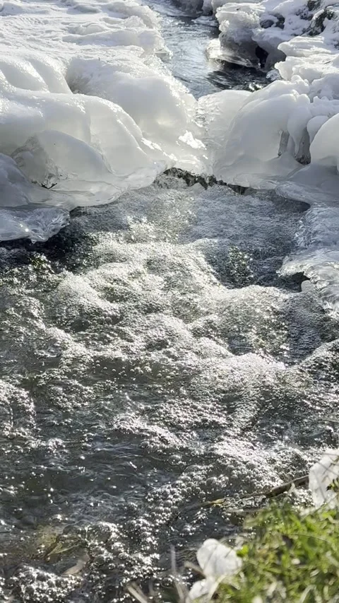 Frothy Rapids: Winter's Icy Cascade Stock Footage 302790208