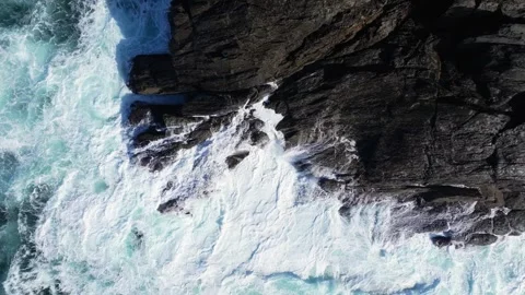 Frothy Waves Hit The Shoreline. Topdown Slow Motion Stock Footage 291526469