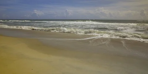 Frothy waves on NC coast Atlantic Ocean on the Outer banks Stock Footage 103492954