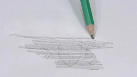 Frottage is the transfer of an image of an object onto paper by rubbing a pencil Stock Footage 150023964