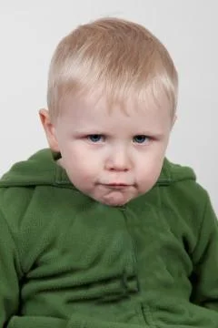 Frowning child Stock Photos