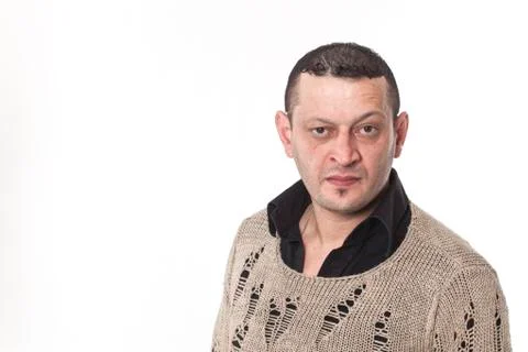 Frowning man portrait looking at camera Stock Photos