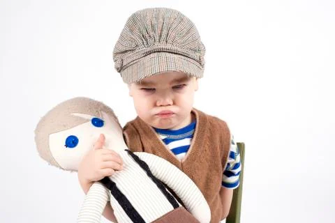 Frowning young boy Stock Photos