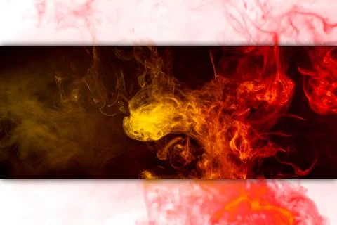 Frozen abstract movement of  explosion smoke multiple colors yellow and orang Stock Photos