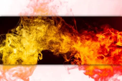 Frozen abstract movement of  explosion smoke multiple colors yellow and orang Stock Photos