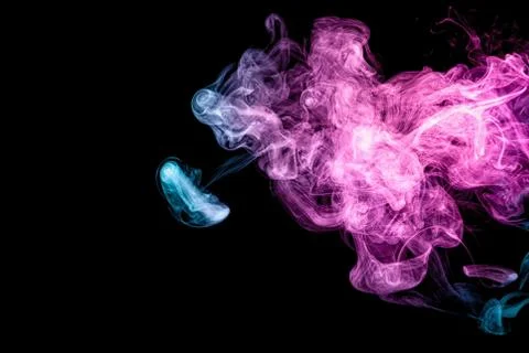 Frozen abstract movement of  explosion smoke multiple blue and pink colors on Foto stock