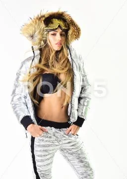 Frozen and mystical. Beautiful winter. Girl in ski or snowboard wear. Happy Stock Photos