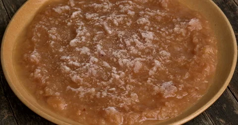 Frozen apple sauce on a plate. Stock Footage 303889607
