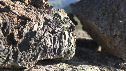 Frozen basalt lava rocks - Geological Formation and Volcanic Surface Stock Footage 339703413