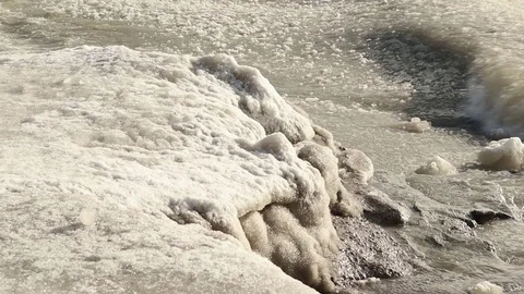 Frozen beach with ice and snow Stock Footage 102388544