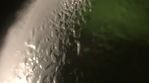 Frozen beer bottle. macro. Video stock 54561097