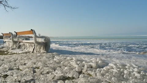 Frozen Benches by the Lakeside of Balaton Video stock 326321612