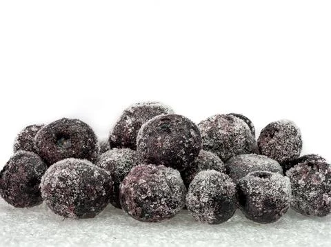 Frozen berries - group on a light background Stock Photos