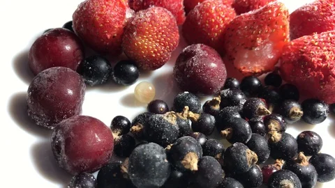 Frozen berries: strawberry, currant, cherry Video stock 103463555