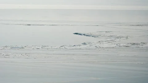 Frozen Blue Sea Ice Surface in Winter Stock Footage 326440197