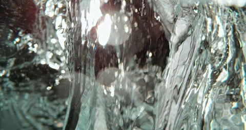 Frozen box falling in water Stock Footage 311826952