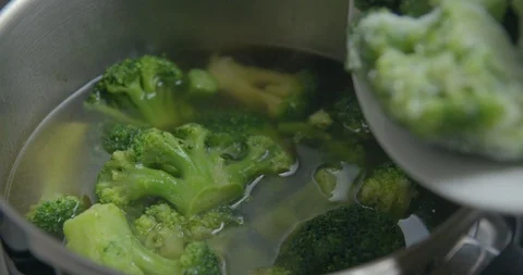 Frozen broccoli cooking slow motion Stock-Footage 85880683