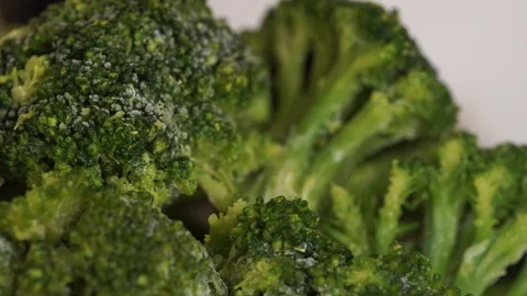 Frozen broccoli. Green broccoli background with ice and frost Stock Footage 119954199