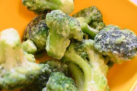 Frozen broccoli pieces 스톡 사진