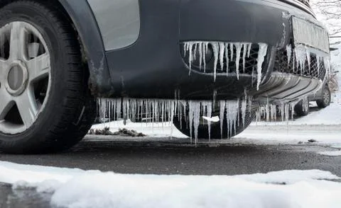 Frozen car with icicles Stock Photos