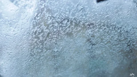 Frozen car windshield covered with ice with working windshield wipers Stock-Footage 167168227