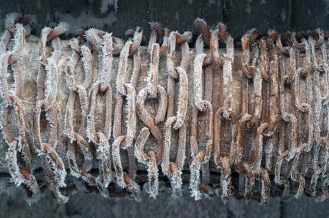 Frozen chain on well Stock Photos
