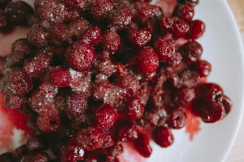 Frozen cherry with sugar Stock Photos
