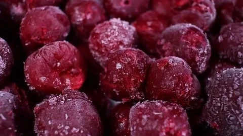Frozen cherry sweet cherries rotating pattern macro texture background backdrop Stock Footage 91379786