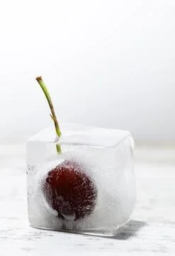 Frozen cherry on table Stock Photos