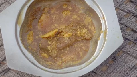 Frozen Chicken Curry Resting in a Rustic Earthen Pot Stock Footage 346503689