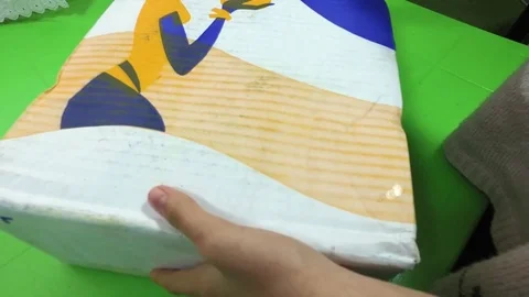 Frozen Chicken thigh in the box. Opens the box Stock Footage 83964880