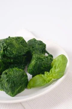 Frozen chopped spinach Stock Photos