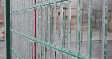 Frozen city environment in the ice icicles.  Climatic icing. Slow motion foot Stock Footage 162515768