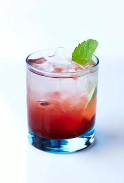 Frozen cocktail with mint leaf garnish in glass Stock Photos