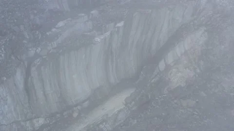 A frozen crack of glacier surface. A torn ice texture of the icefall relief and Stock Footage 169749961