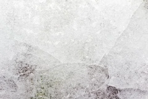 Frozen cracked ice texture background. Stock Photos