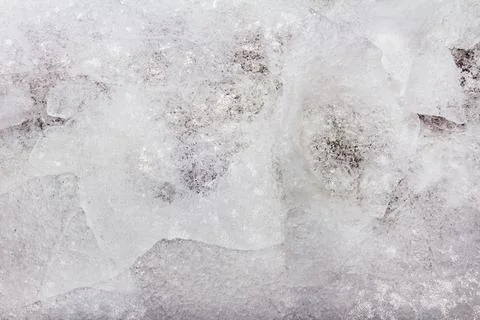 Frozen cracked ice texture background. Stock Photos