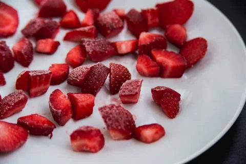 Frozen cut strawberries Stock Photos