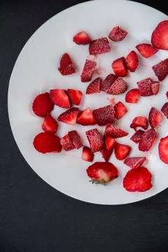 Frozen cut strawberries Stock Photos