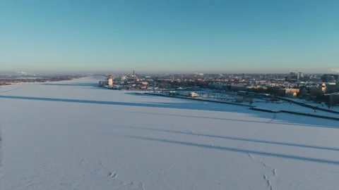 Frozen Daugava River and Riga Waterfront - Drone Flying Toward Petersala Latvia Stock Footage 346271307