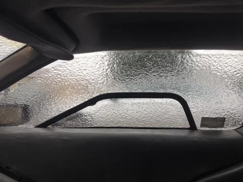 Frozen DMC Delorean Window Covered in Ice Stock Photos