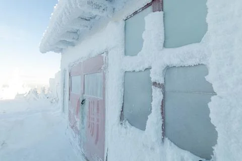 Frozen doors of a Buddhist temple. high in the mountains Stock Photos