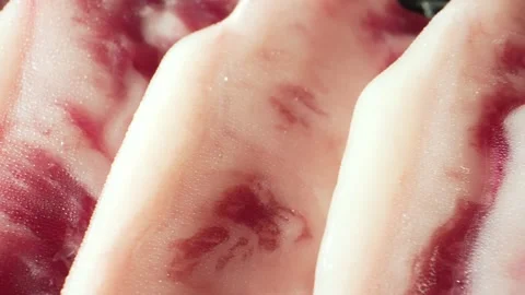 A frozen dry-aged beef in a vacuum pack. 4K Stock Footage 245733780