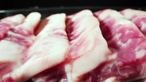 A frozen dry-aged beef in a vacuum pack. 4K Stock Footage 245733900