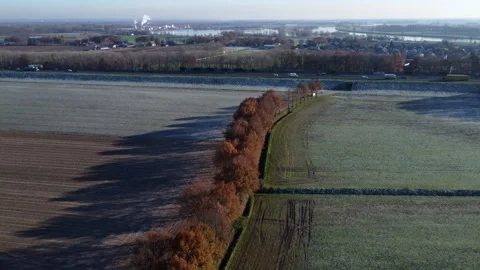Frozen Dutch Fields: Aerial View of Majestic Landscapes with Highway and Railway Video stock 241113625