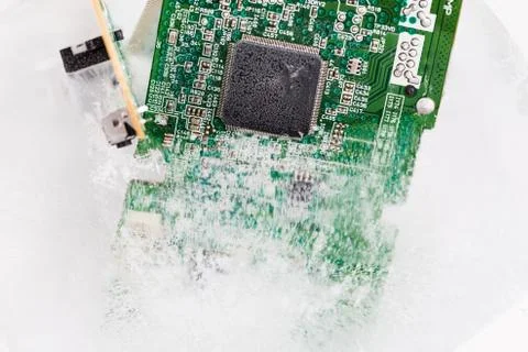 Frozen electonics board for pc in ice Stock Photos