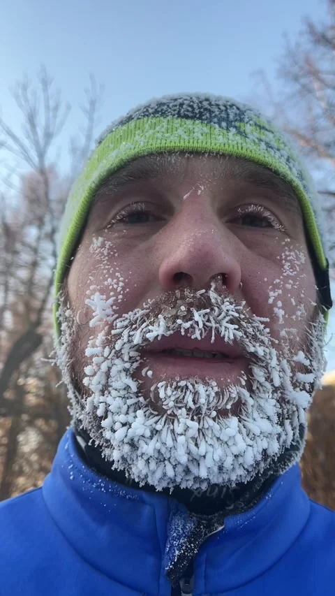 The frozen face of a man after jogging in the cold Stock Footage 260340763