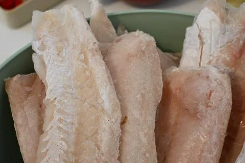 Frozen fish fillets in a bowl Fotos de archivo