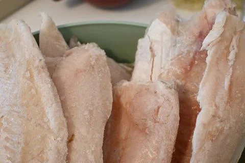 Frozen fish fillets in a bowl Fotos de archivo